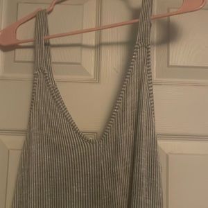 Grey striped jumpsuit size M. Length is right at ankles and I am 5.6’.